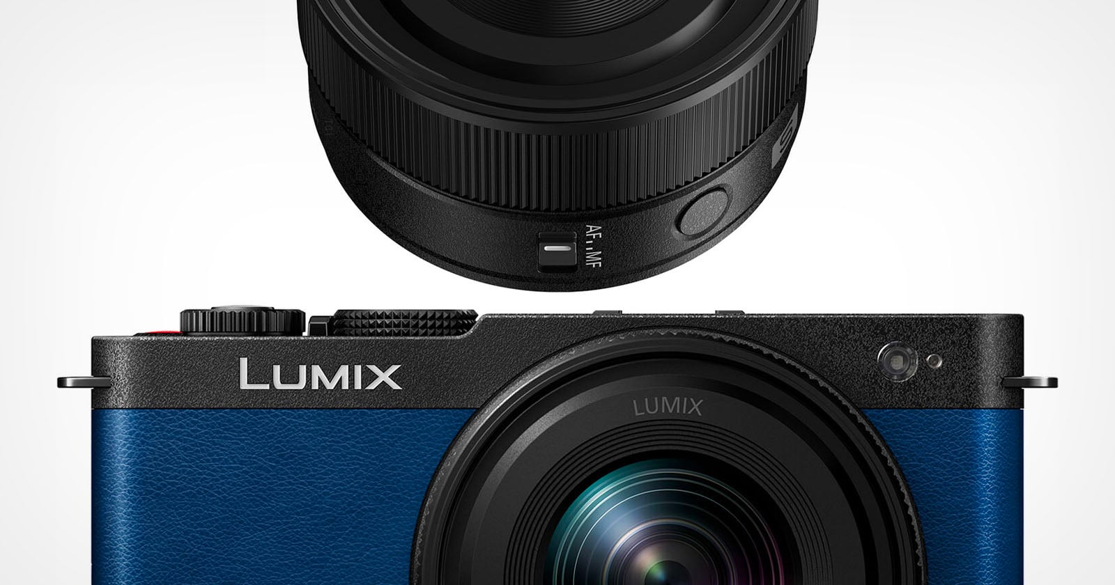 A blue Lumix camera body is shown below a close-up view of its black lens, which features an AF/MF focus switch.