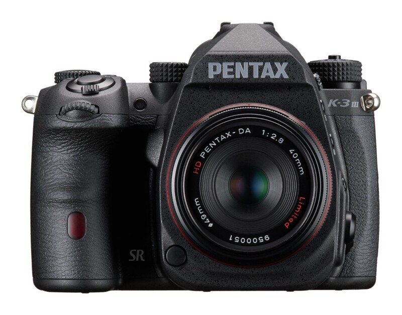 A front-facing Pentax K-3 Mark III DSLR camera with a 40mm lens attached, set against a plain white background.