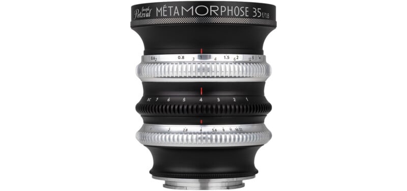 A black Joseph Petzval Métamorphose 35 f/1.8 camera lens with three silver and black adjustment rings against a white background.