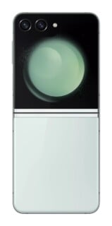 A light green foldable smartphone shown in its closed position, featuring a large external display with a circular graphic and two rear camera lenses.