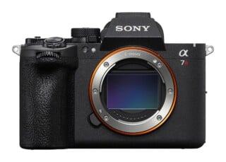 A front-facing Sony Alpha 7R mirrorless camera body with an E-mount lens opening and visible sensor.