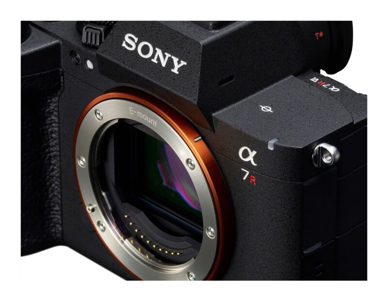 A close-up view of a black Sony Alpha 7R IV camera body, showing the E-mount lens opening and the front-facing branding.