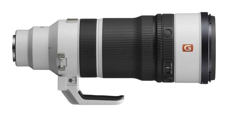 A white and black telephoto zoom lens with a tripod mount, a G-Master logo, and a zoom smoothness adjustment switch.