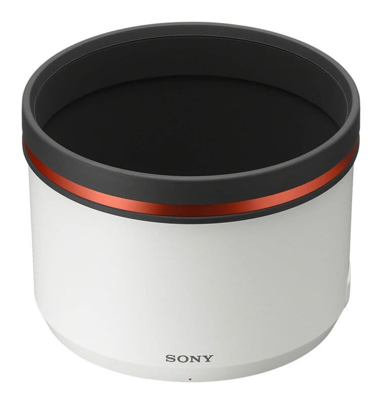 A white Sony camera lens hood with a black interior and a metallic orange ring around the top edge, shown against a white background.
