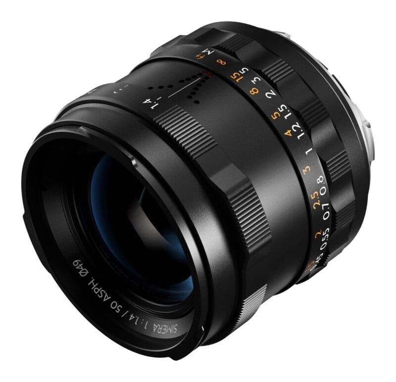A black camera lens with manual focus and aperture rings, labeled "SIMERA 1:1.4 / 50 ASPH. Ø49" around the front element.