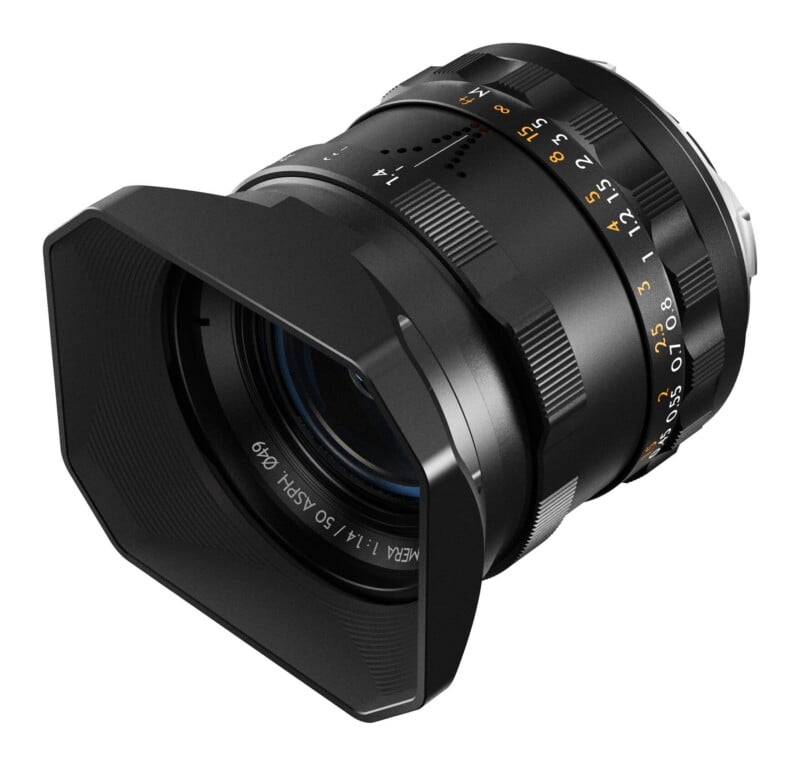 A black camera lens with a square lens hood, featuring focus distance markings in feet and meters and an aperture setting of 1.4.