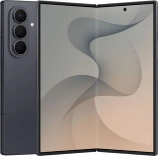 A dark gray foldable smartphone is shown partially open, displaying a smooth, abstract gray and beige wave pattern on its inner screen.