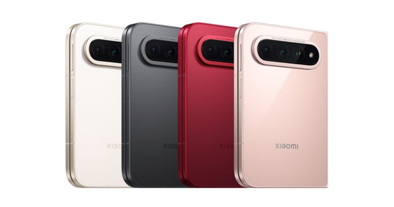 Four foldable smartphones in white, gray, red, and rose gold are lined up side-by-side against a white background.