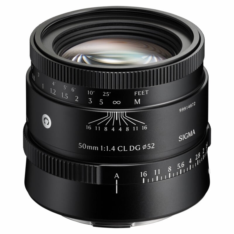 A black Sigma 50mm 1:1.4 camera lens with a manual focus ring, depth-of-field scale, and an aperture control ring set to A.