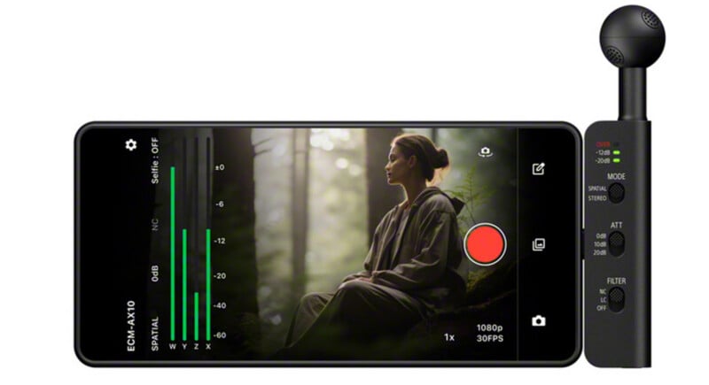 A smartphone displays a video recording interface with audio levels and settings, attached to a vertical microphone unit on its right side.
