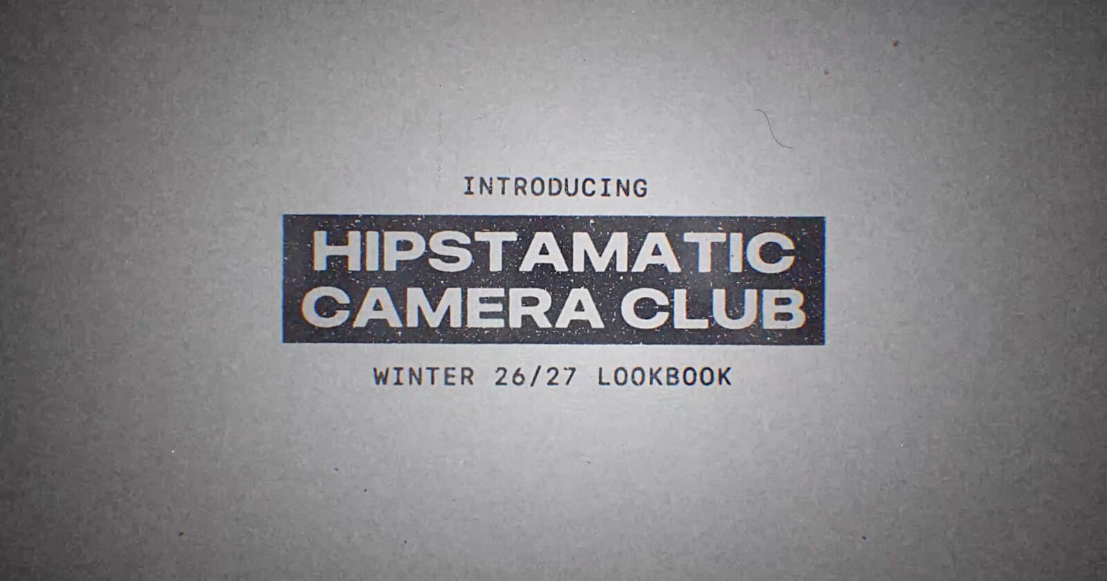 Text on a textured gray background reads: INTRODUCING HIPSTAMATIC CAMERA CLUB WINTER 26/27 LOOKBOOK.