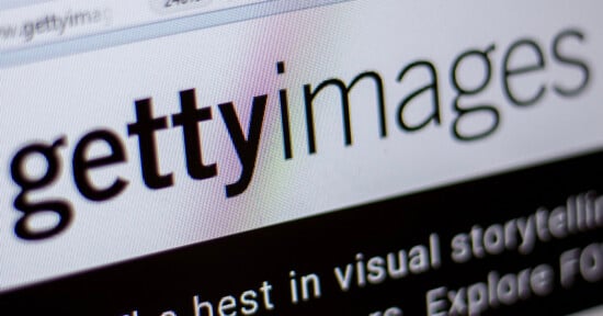 A close-up view of a computer screen displaying the Getty Images logo and a portion of the website's text.