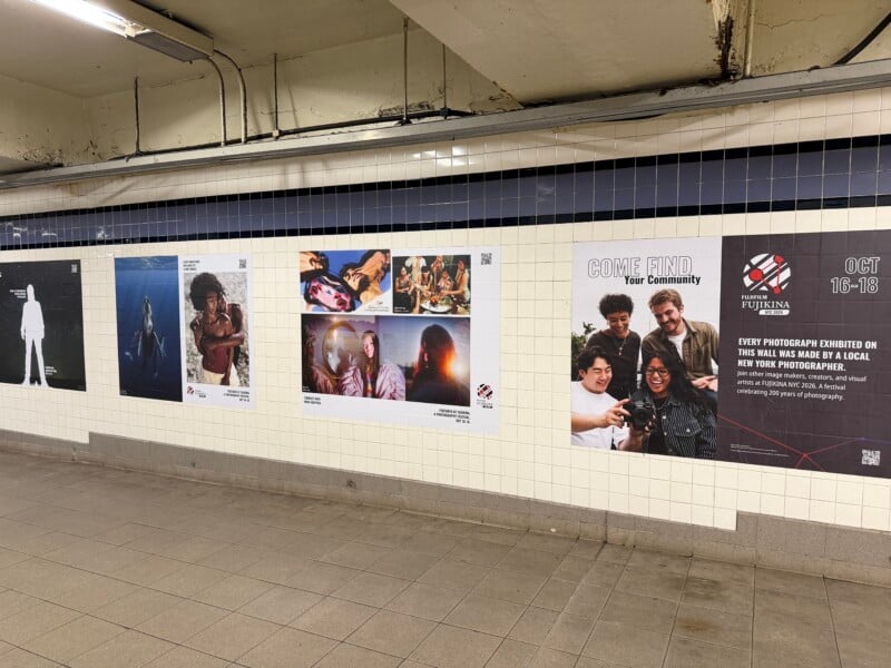 A series of Fujifilm Fujikina NYC 2026 promotional posters featuring photography and event information are displayed on a subway station tiled wall.