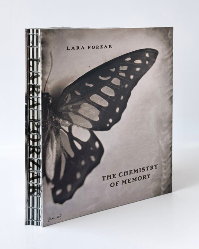 A book titled The Chemistry of Memory by Lara Porzak, featuring a black-and-white photograph of a butterfly on the cover.
