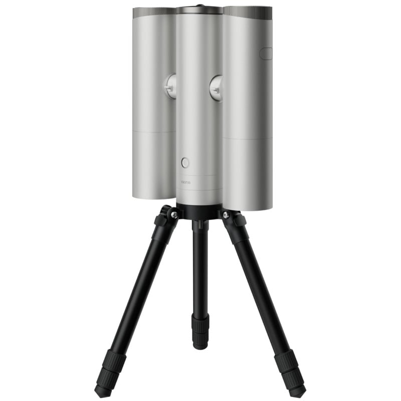 A silver, three-column cylindrical device mounted on a black tripod against a white background, with the word "vaonis" printed on the center column.