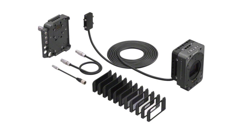 A Sony camera sensor block connected by a long cable to a mounting plate, accompanied by several short cables and a series of rectangular filter frames.