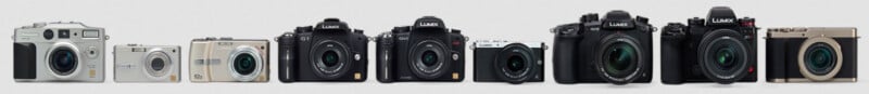 A horizontal lineup of nine Panasonic Lumix digital cameras of various styles and sizes, ranging from compact point-and-shoots to larger mirrorless models.