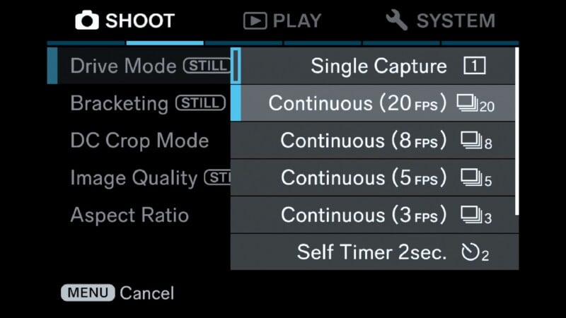 A digital camera menu screen showing the Shoot tab with Drive Mode selected, displaying a list of options including Single Capture, various Continuous frame rate settings, and a 2-second Self Timer.