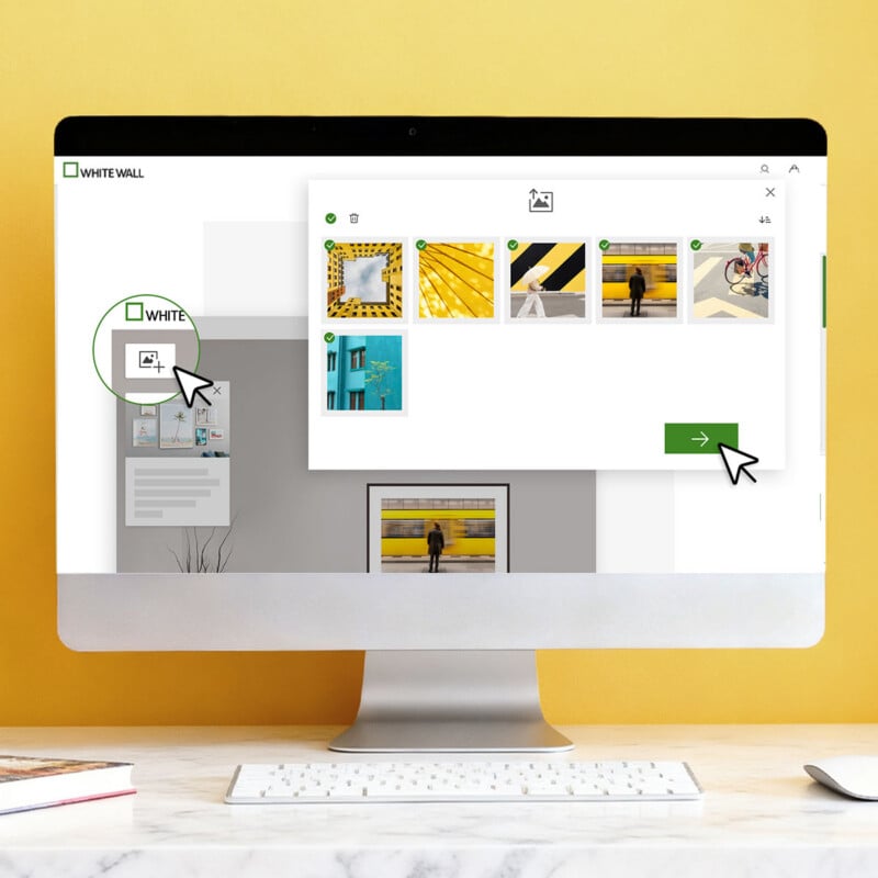 A computer monitor displays a WhiteWall website interface with a pop-up window showing six selected images and a green arrow button to proceed.