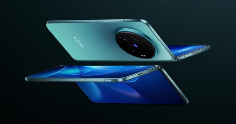 Two teal-colored smartphones are floating against a dark background, one showing its back with a large circular camera module and the other showing its illuminated screen.