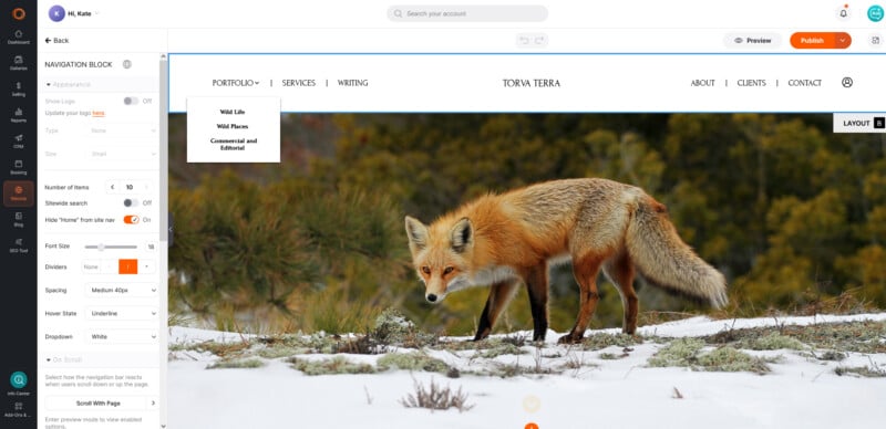 A website editor interface displaying a navigation bar with the text "TORVA TERRA" above a large photograph of a fox in snow.