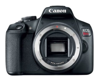 A black Canon EOS Rebel T7 DSLR camera body shown from the front without a lens attached.