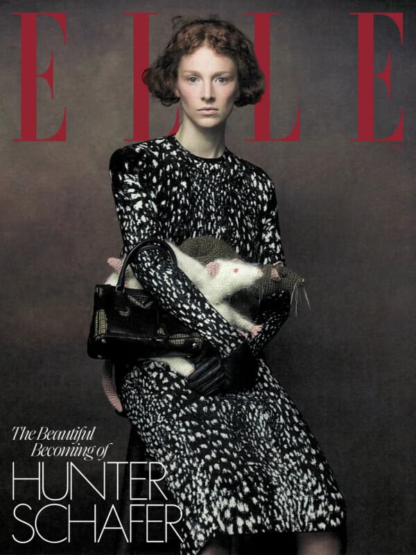 Hunter Schafer appears on the cover of Elle magazine, wearing a black and white patterned dress and holding a black handbag with two knitted rat figures.