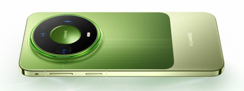 A green Huawei smartphone lying on its side, featuring a large circular camera module with XMAGE branding and a textured back panel.