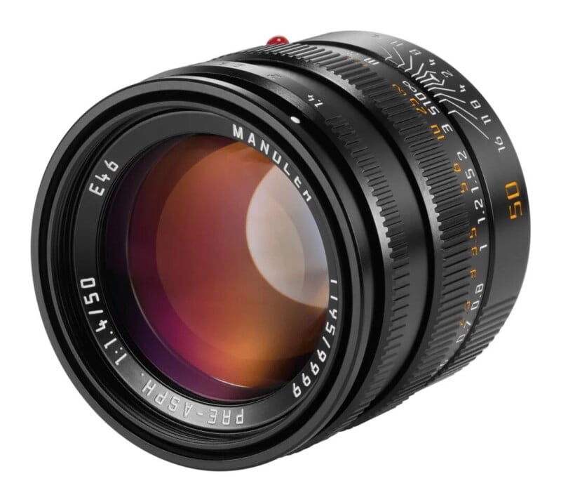A black manual focus camera lens with a 50mm focal length and 1:1.4 aperture, featuring an E46 filter thread and depth of field scale.