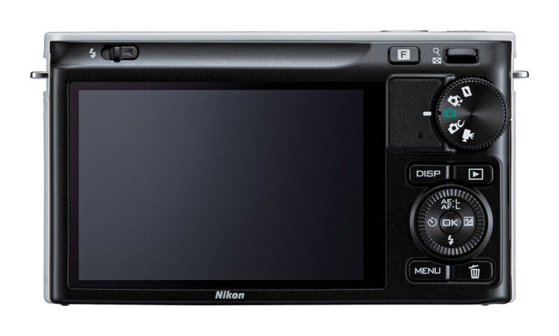 The back of a black Nikon digital camera featuring a large LCD screen, a mode dial, a multi-selector wheel, and various function buttons.