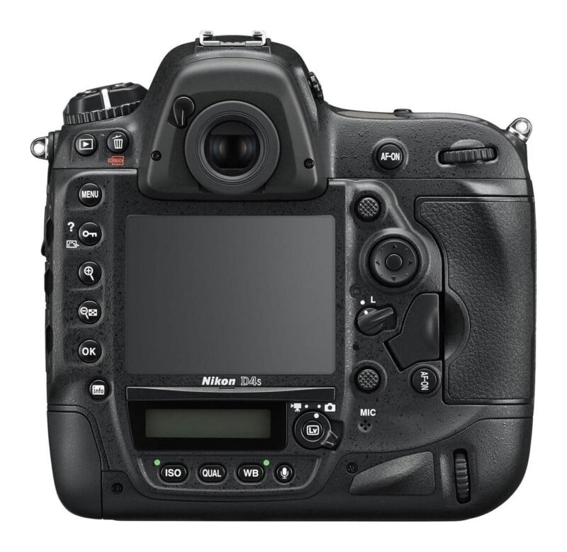 The back of a black Nikon D4s DSLR camera, showing the LCD screen, viewfinder, various control buttons, and a secondary status display at the bottom.