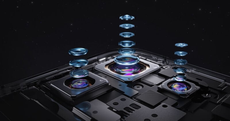 A close-up view of three camera lens assemblies with their internal glass elements floating in stacked layers above a device.
