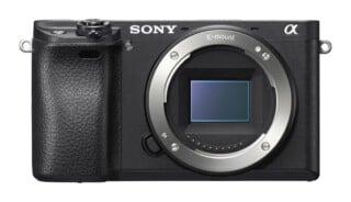 A black Sony Alpha mirrorless camera body with an E-mount lens opening, shown from the front.