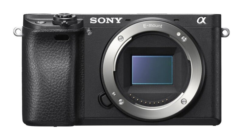 A black Sony Alpha mirrorless camera body with an E-mount lens opening, shown from the front.