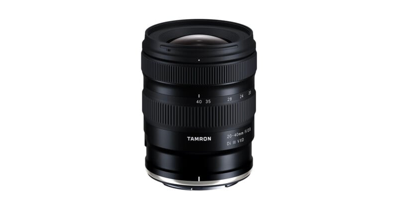 A black Tamron 20-40mm F/2.8 Di III VXD camera lens standing upright against a white background.