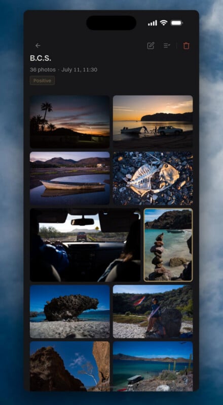 A mobile phone screen displays a photo gallery titled B.C.S. containing a grid of ten landscape and travel images featuring beaches, a boat, a fish skeleton, and a car interior.